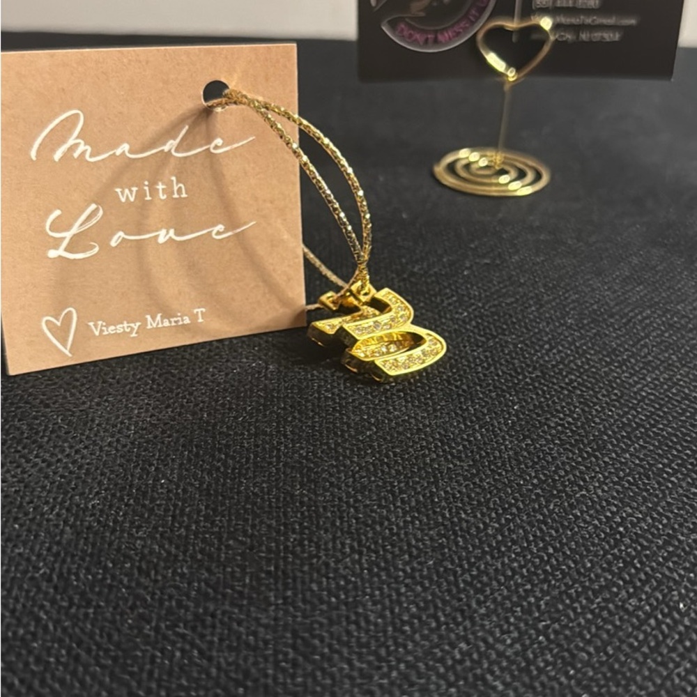 Gold Plated Circle Design earring’s with initial u by Viesty Maria T